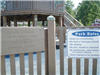 Park Rules Sign Posted at Playground Entrance