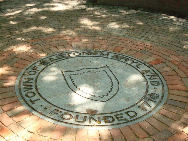 Stone Town Seal Engraved Int He Center of a Small Plaza